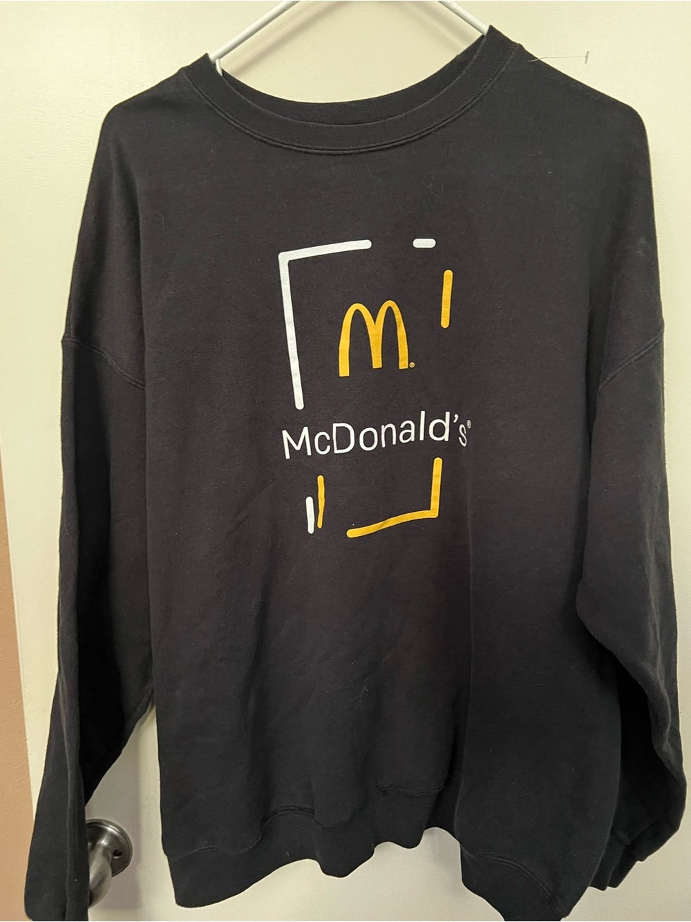 Hanes Black Crewneck Sweatshirt with Yellow Graphic Mc Donald’s Halloween worker